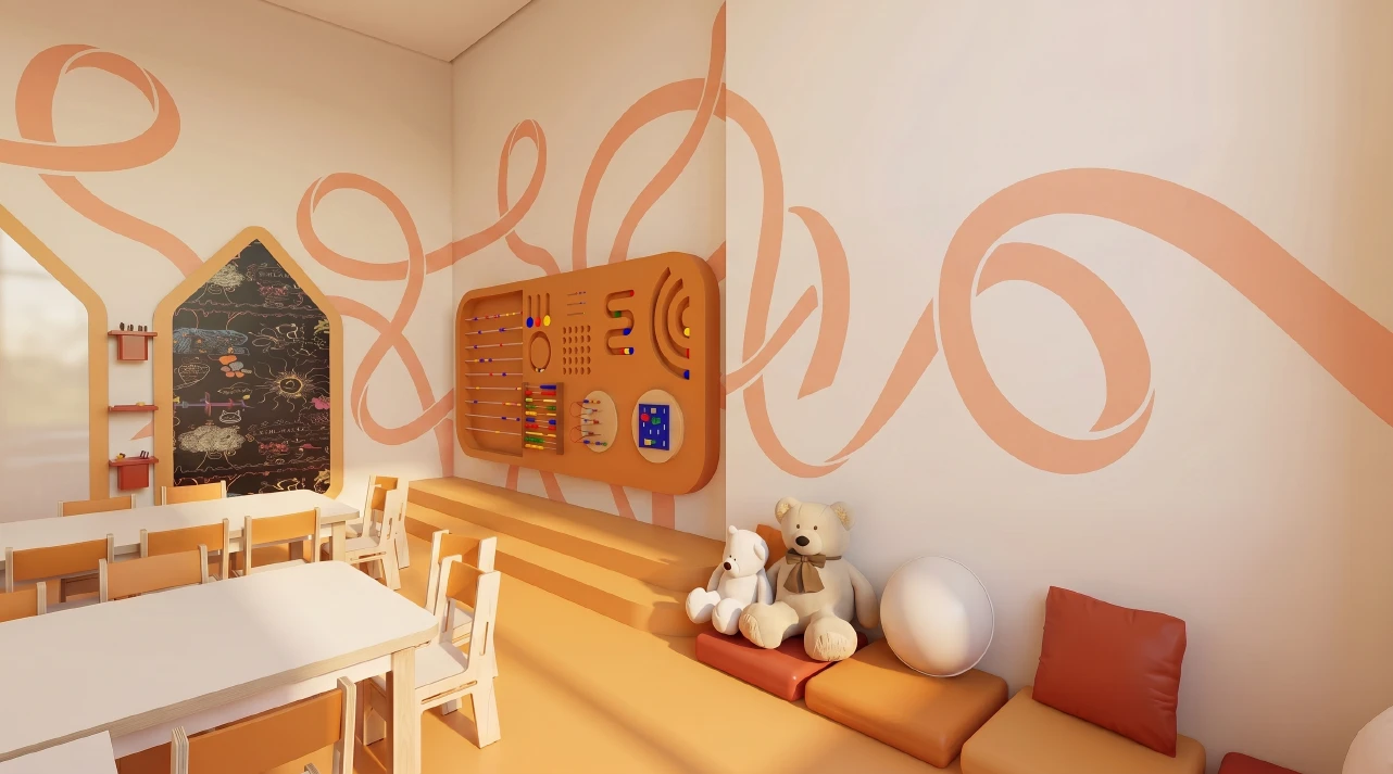 Vue complète de la salle abricot avec panneau de manipulation, tables basses, coussins et peluches.